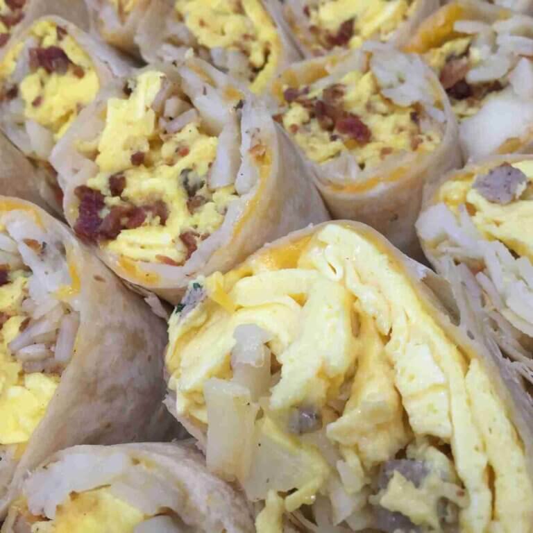 Platter of wrapped breakfast burritos