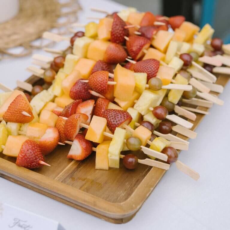Fruit skewers set out for an event