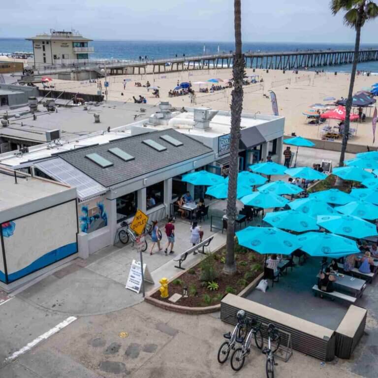 Good Stuff Hermosa Beach patio with blue umbrellas